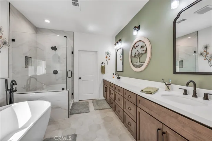 Highly upgraded Primary Bathroom with separate Tub & Shower
