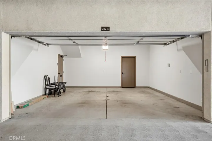 The garage side door leads to the lobby and the rear door leads to a good sized storage room.