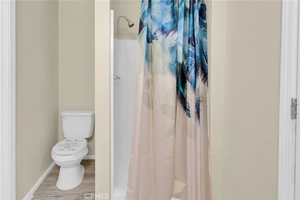 Convenient cabana-style bathroom with direct access, ideal for use from outdoor areas and everyday functionality