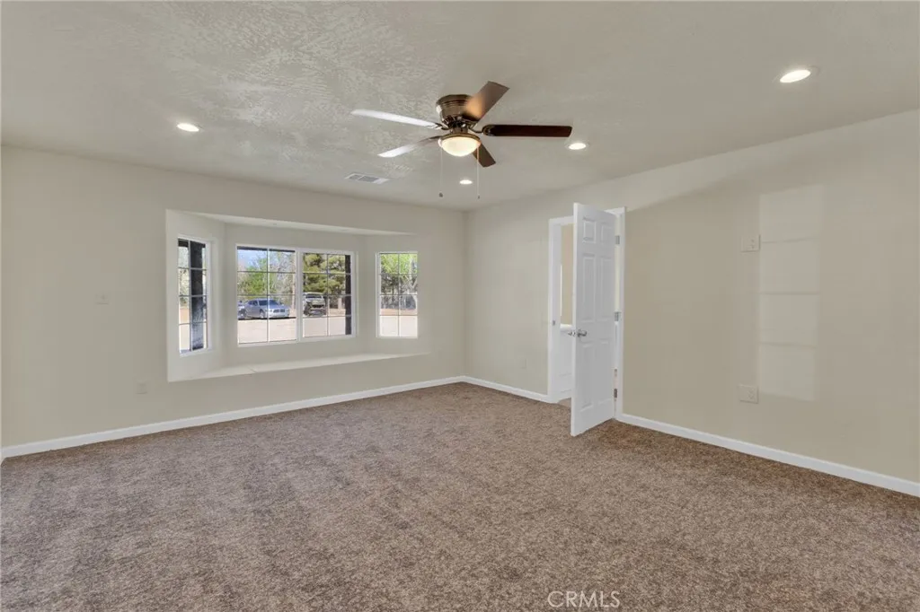 Bedroom 5, Large primary bedroom offering comfort, privacy, and plenty of space for a full bedroom setup.