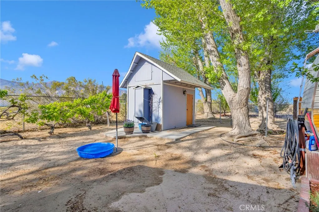 Several outdoor storage structures provide flexible space for equipment, tools, or hobby use.
