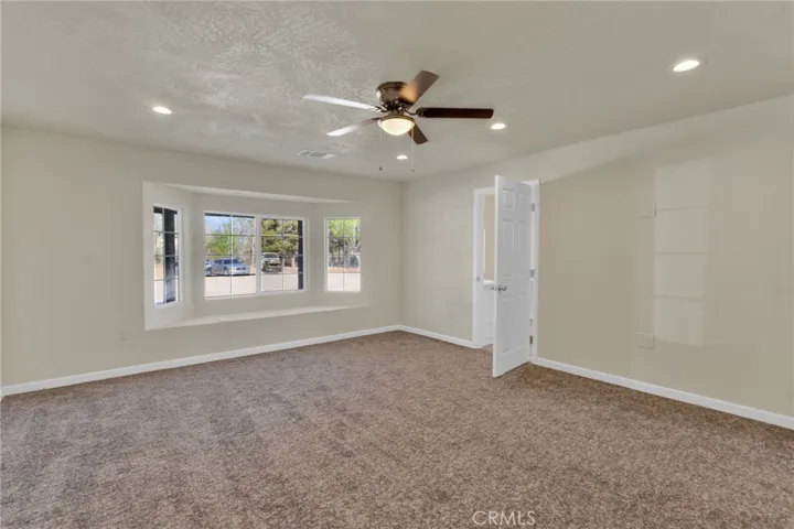 Bedroom 5, Large primary bedroom offering comfort, privacy, and plenty of space for a full bedroom setup.