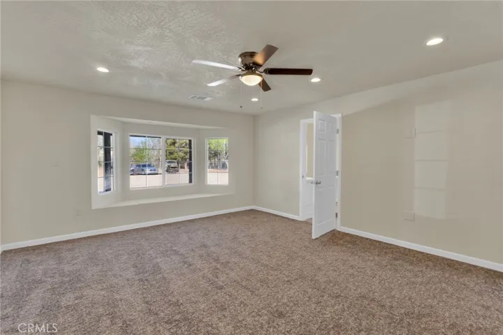 Bedroom 5, Large primary bedroom offering comfort, privacy, and plenty of space for a full bedroom setup.
