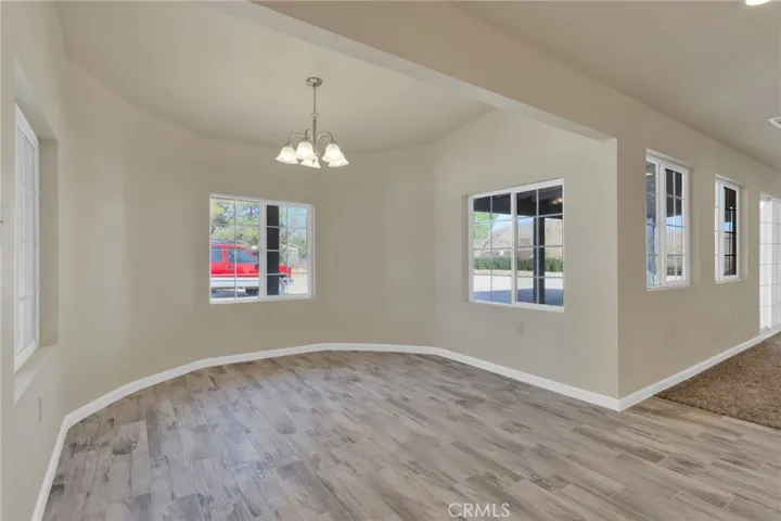 Generous dining space off of kitchen ideal for gatherings, positioned within the open-concept floor plan for easy entertaining.