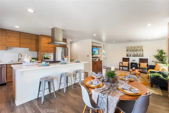 Dining Room and Kitchen with Quartz Center Island with Seating