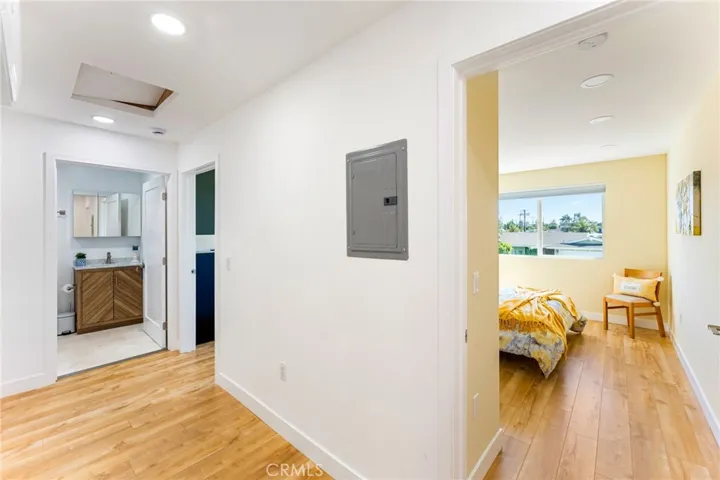 2 Room ADU with Wide Hallway, Recessed Lighting, Wood Laminate Flooring, Raised Panel Doors, a Separate Mini-Split A/C, Tall Baseboards, Dual Pane Windows, and Custom Blinds