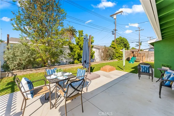 Backyard with Concrete Patio, Lawn, Raised Planters, and 2 Extra Wide Side Yards