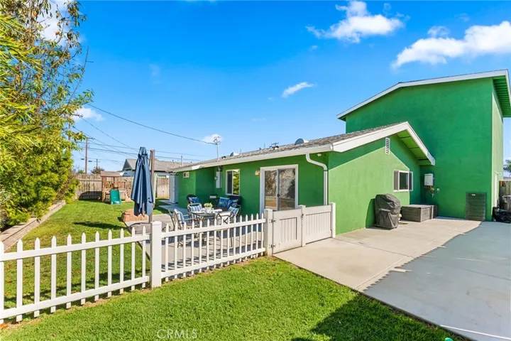 Fenced Area with Grass and Large Concrete Patio for Dog Run or can be used as a Separate Yard to go with the ADU