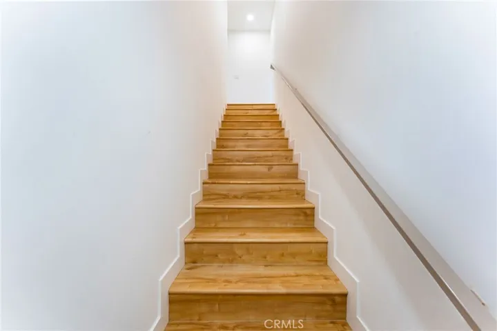 Wood Laminate Flooring Up the staircase and Throughout the ADU