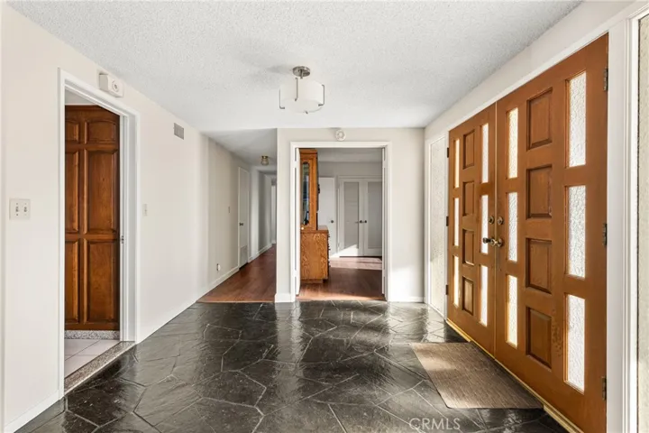 entry double doors looking toward 5th bedroom