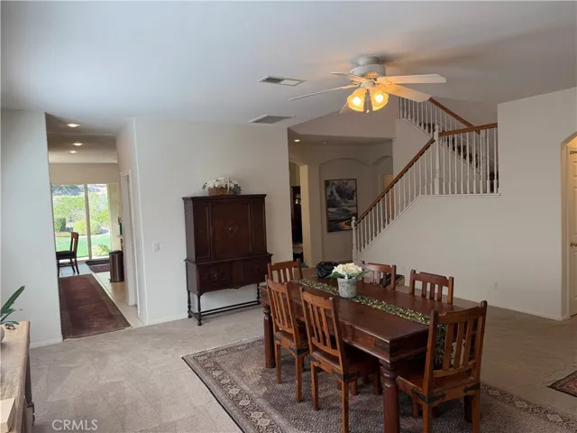 Living room looking toward kitchen and family room