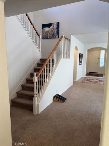 Stairway to 2 bedrooms and large loft