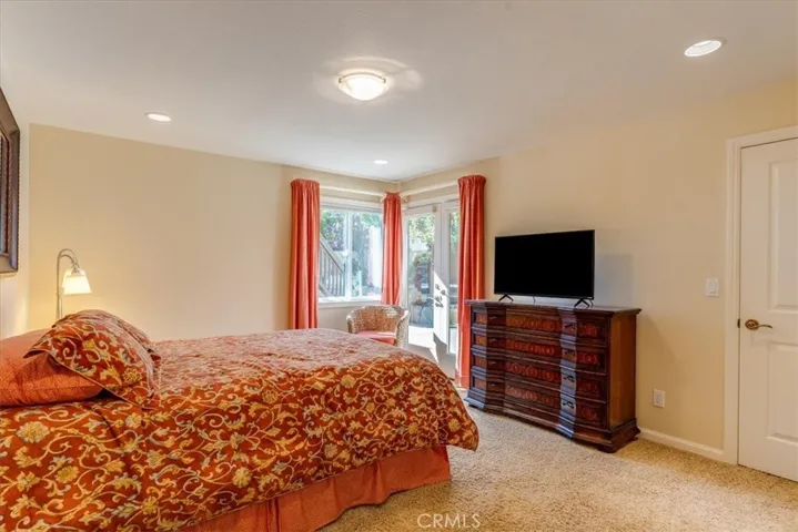 Larger secondary bedroom has exterior access.