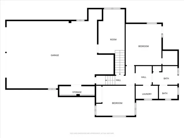 lower level is the garage and craft/work room.  Up half a flight of stairs are two bedrooms, bath, laundry