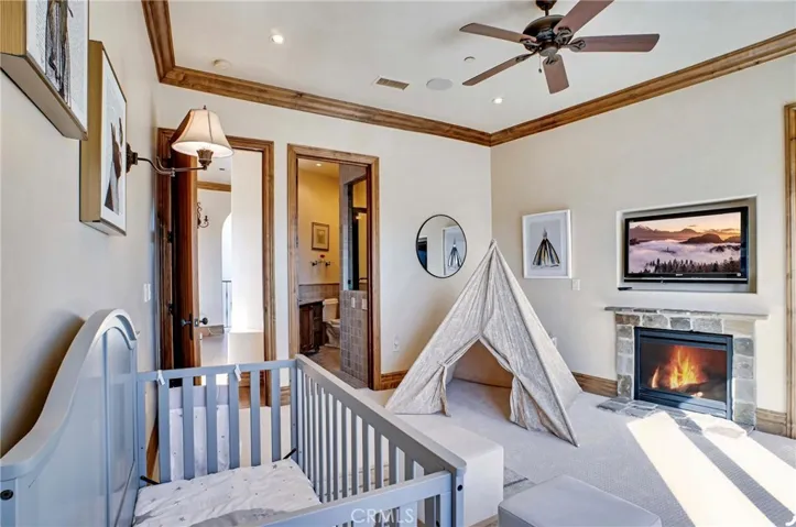2nd upstairs bedroom with en-suite bathroom and fireplace with balcony