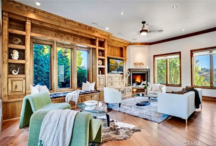 Formal family room just past the dining area with fireplace
