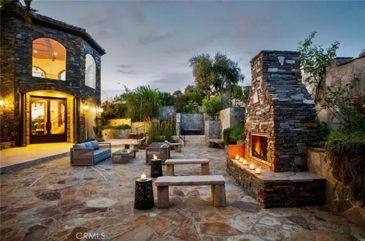 Cozy courtyard fireplace and waterfalls