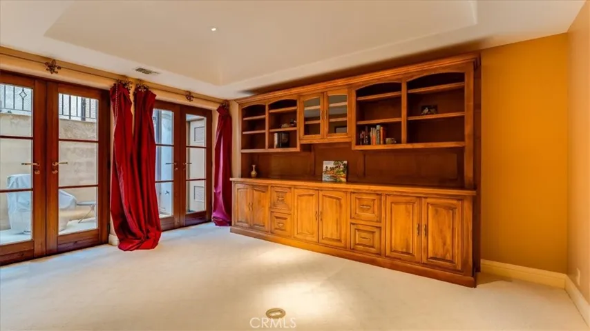 Office. The large bookshelf may be removed if one desires a 4th bedroom.