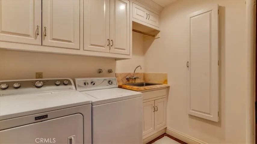 Laundry Room is on the same level as the primary bedroom.
