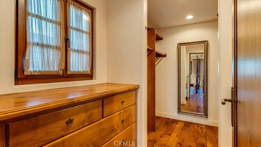 Multiple closet areas with built-ins are found in the primary bedroom