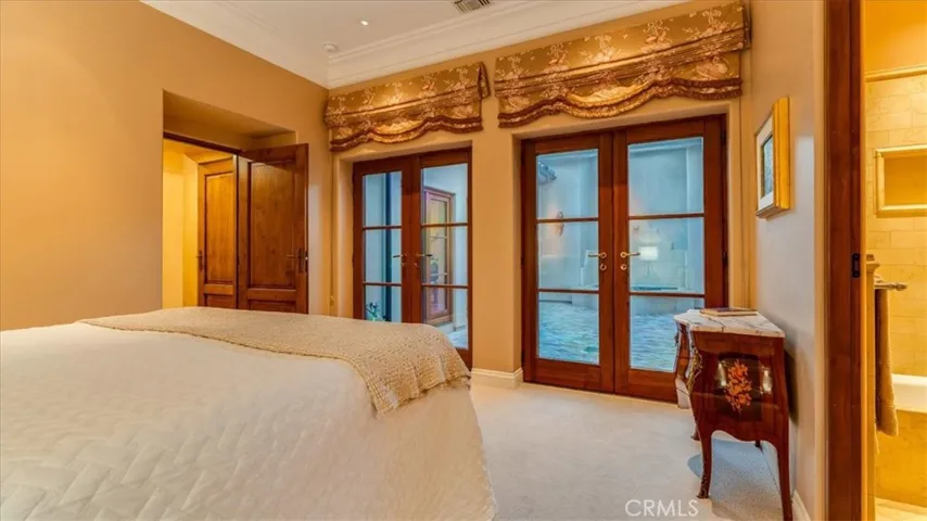 The third bedroom has glass doors to the inner courtyard.