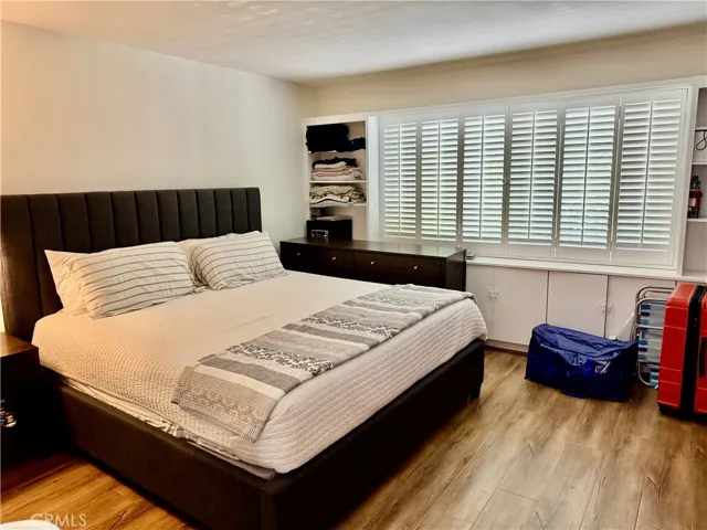 Primary Bedroom with Shutters on Windows
