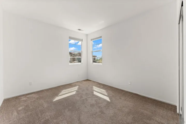 Upstairs bedroom with attached full bathroom