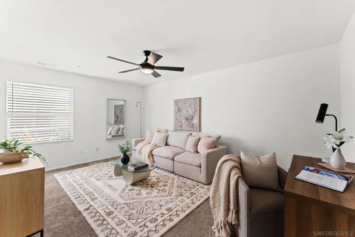 Downstairs bedroom ideal for secondary living room, office, or guest suite