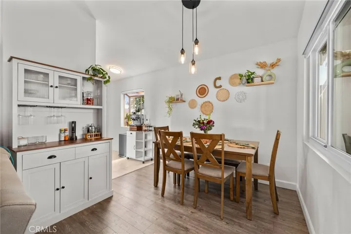 Dining area leading into kitchen