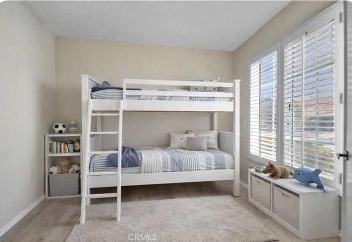 Office without bookcases & staged as child bedroom