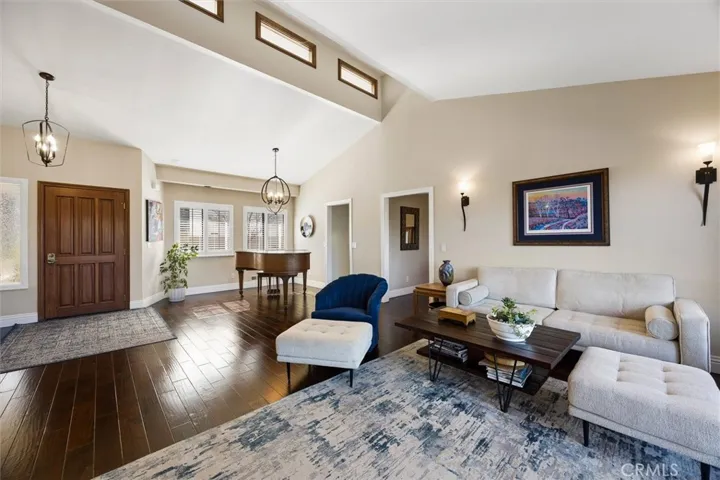 High ceilings bring in warm light throughout the room.