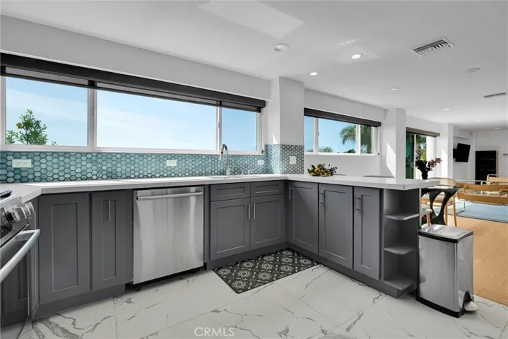 Another angle of full kitchen