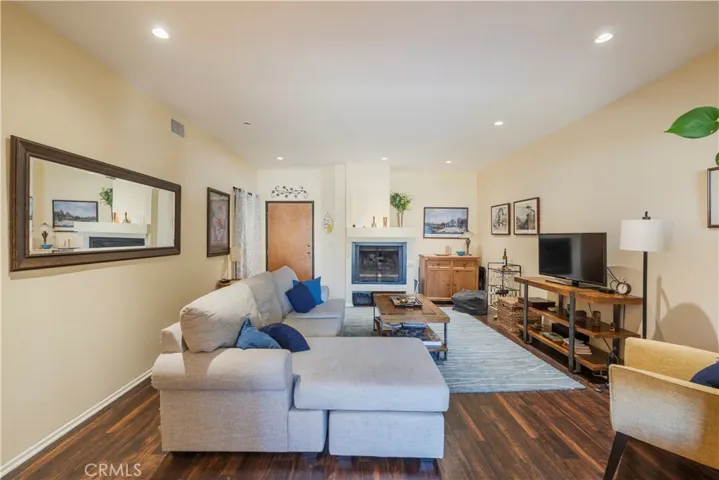 Large open living space with high ceilings.
