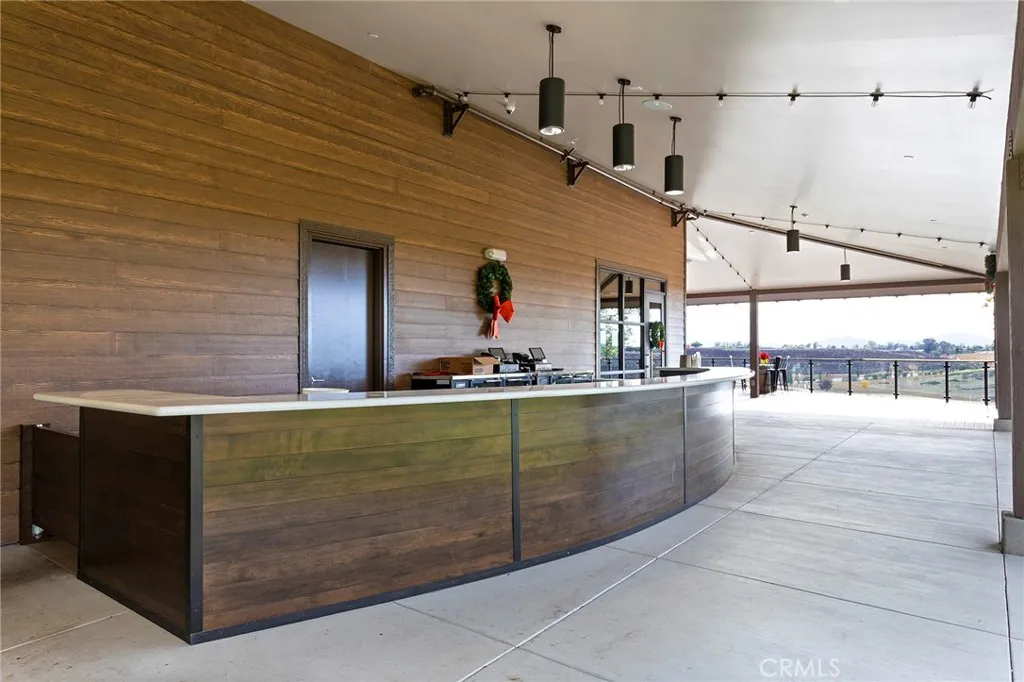 Outdoor Tasting Room Serving area on covered patio with views