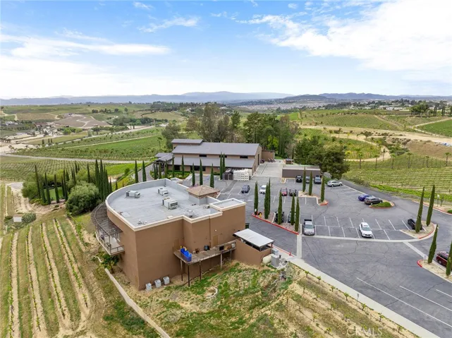 View over Restaurant, Winery and Tasting room, Paved Parking and Vineyards