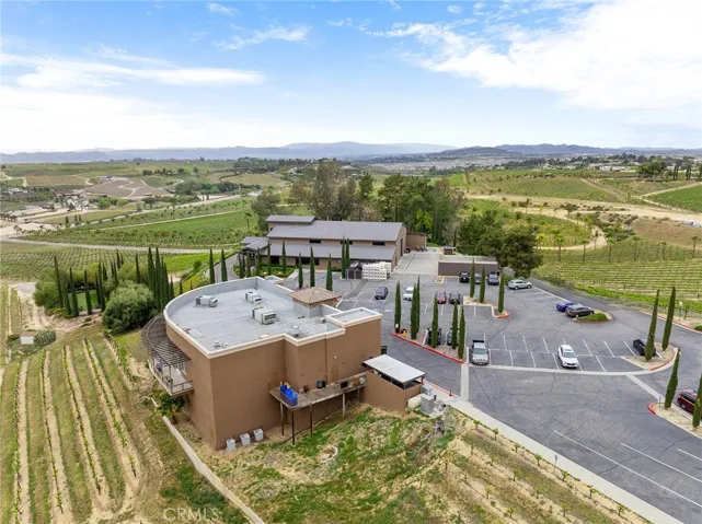 View over Restaurant, Winery and Tasting room, Paved Parking and Vineyards