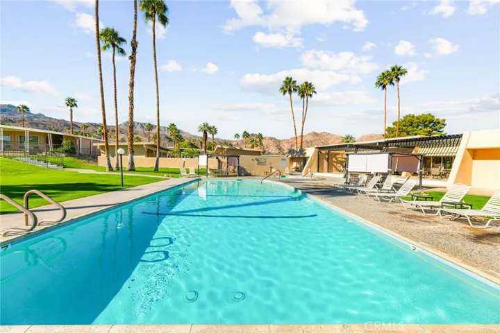 The resort like community pool is a perfect way to cool off with family and friends Cheers!