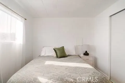 An inviting guest bedroom awaits your family and friends who may spend a night visiting.