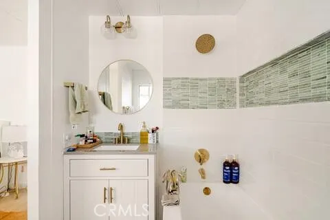 A jetted soaking tub is in the primary suite.
