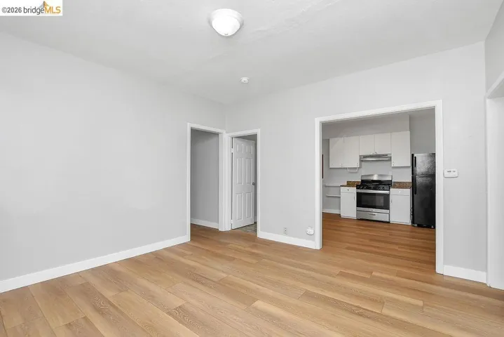 Unfurnished living room with light wood-style floors