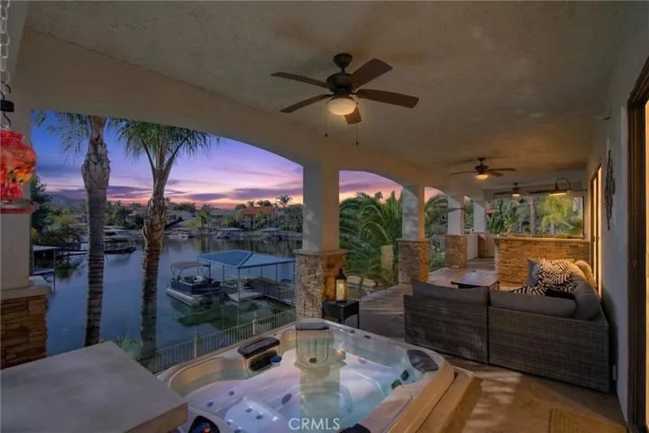 Relax in your private spa overlooking the lake