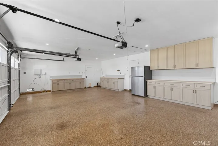 3-car garage + flat driveway