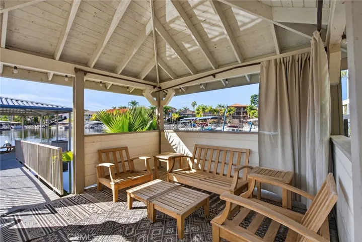 Lakeside pergola for relaxing or storing water toys