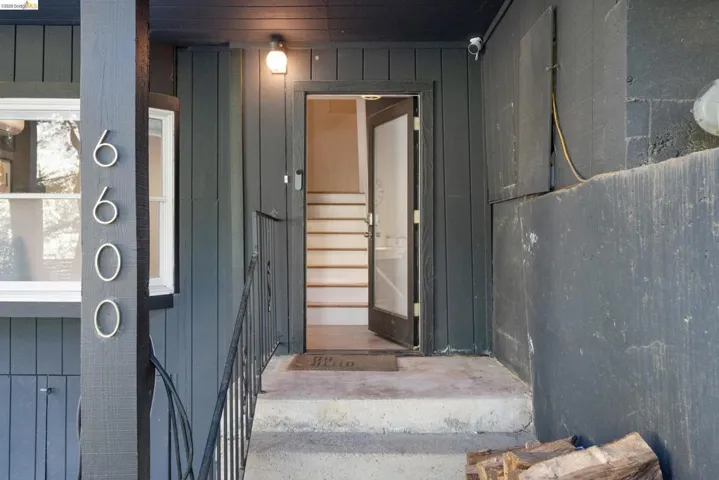 Property entrance with board and batten siding
