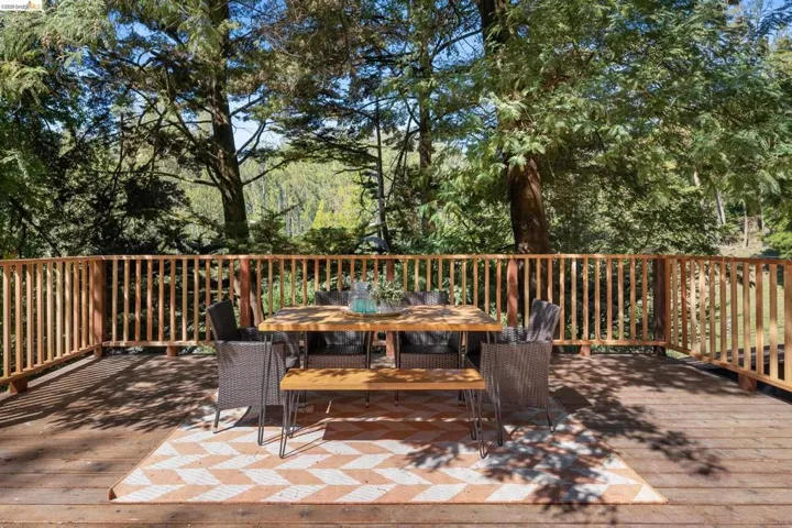 Wooden terrace with outdoor dining area