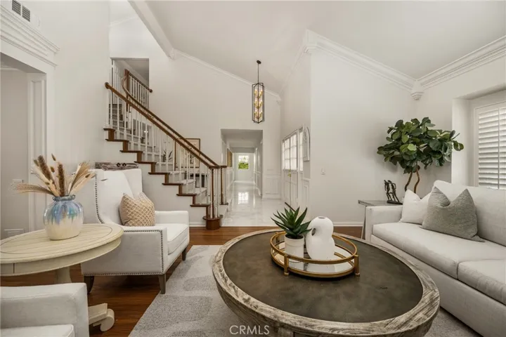View of the two story entry from the formal living room area.