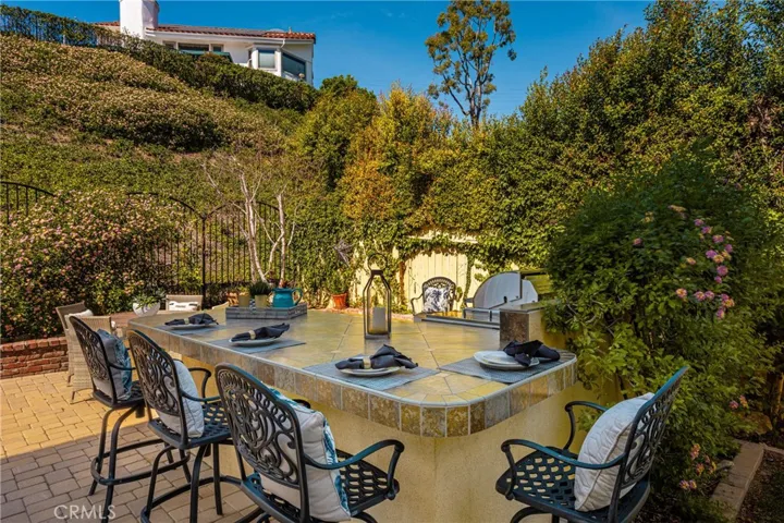 Large outdoor bar features a new grill and added space for dining at anytime of day!