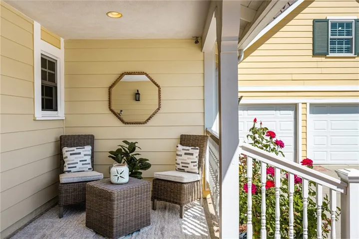 A cozy seating area on the front porch to enjoy at any time of day!