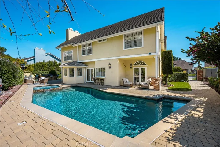 Large pool with stone pavers is ideal for family, but large enough for friends to join in the fun!