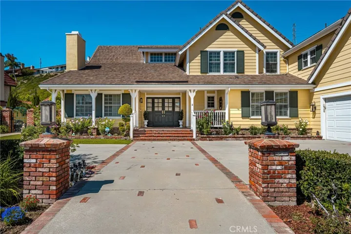 Brick accents leading you to the front entry.